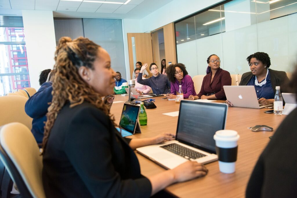 A community program lead facilitates a planning session