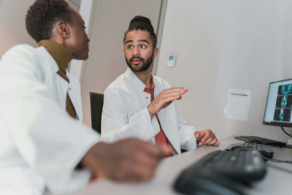 Doctors of different backgrounds review research together